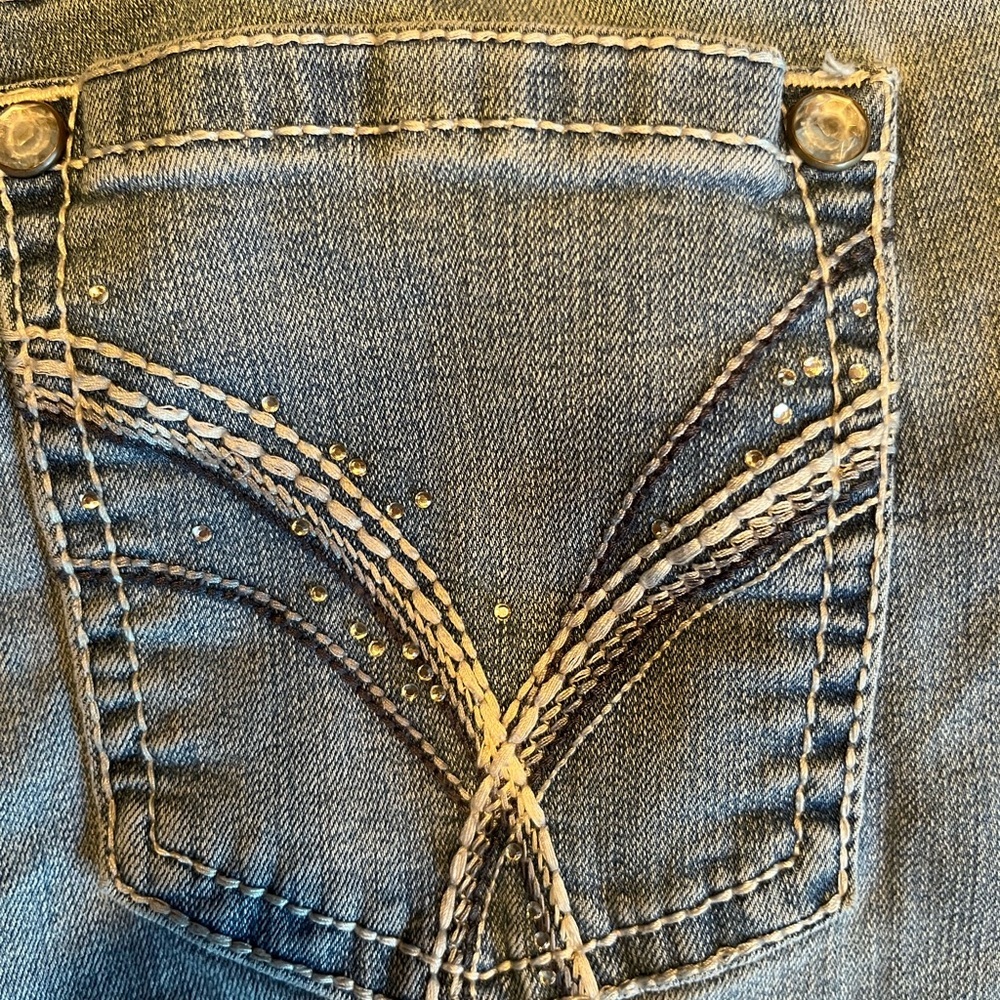 Wallflower jeans with studs on the back pockets. Size 11